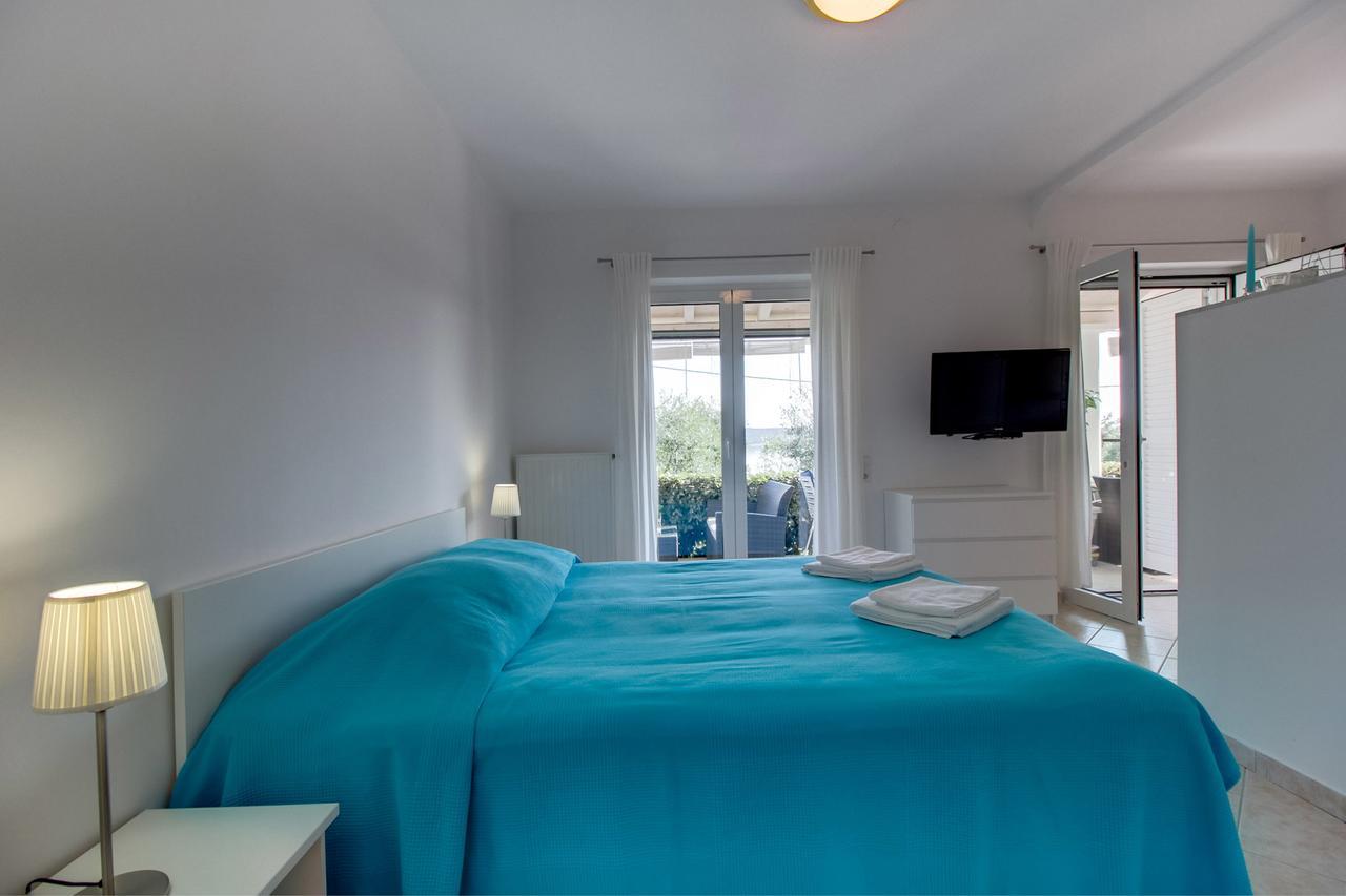 Apartments Del Sole Нерезине Номер фото