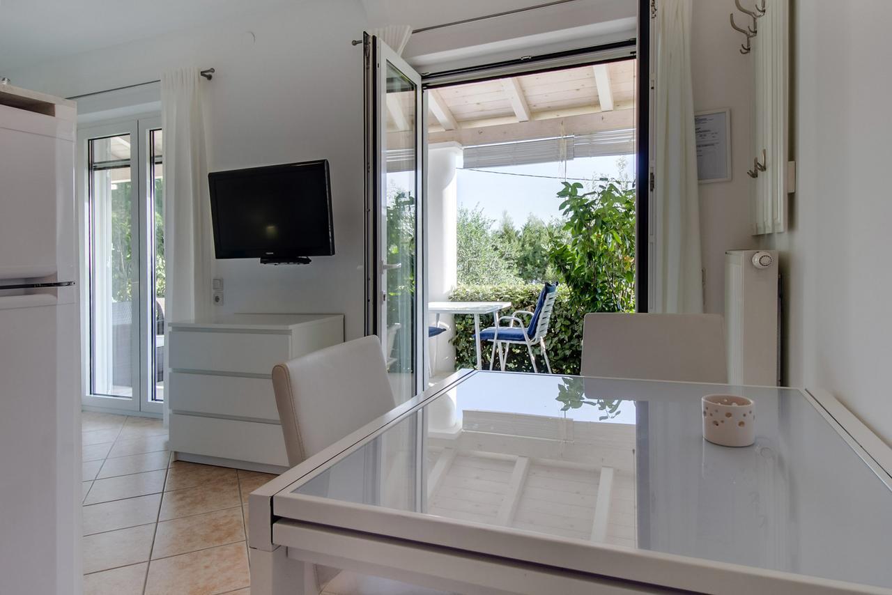 Apartments Del Sole Нерезине Номер фото